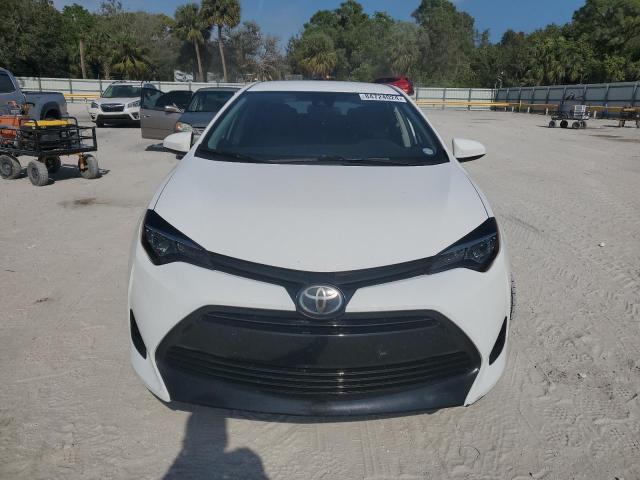 Photo 4 VIN: 2T1BURHE3KC206357 - TOYOTA COROLLA L 