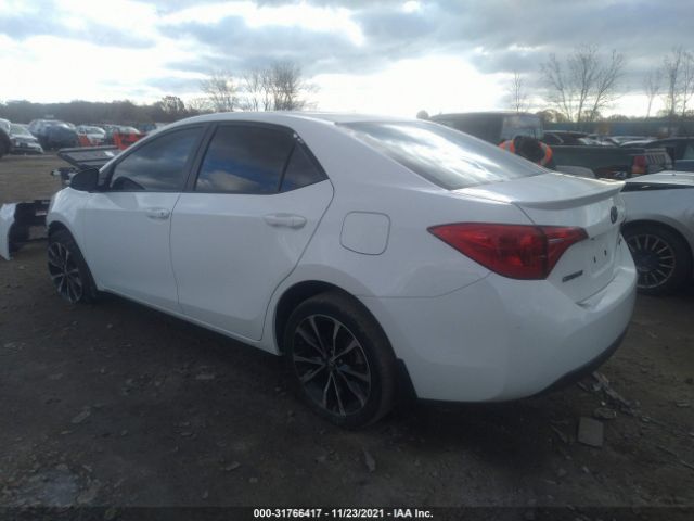 Photo 2 VIN: 2T1BURHE3KC214877 - TOYOTA COROLLA 