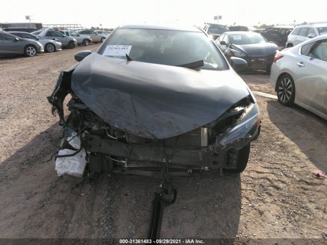 Photo 5 VIN: 2T1BURHE3KC228276 - TOYOTA COROLLA 