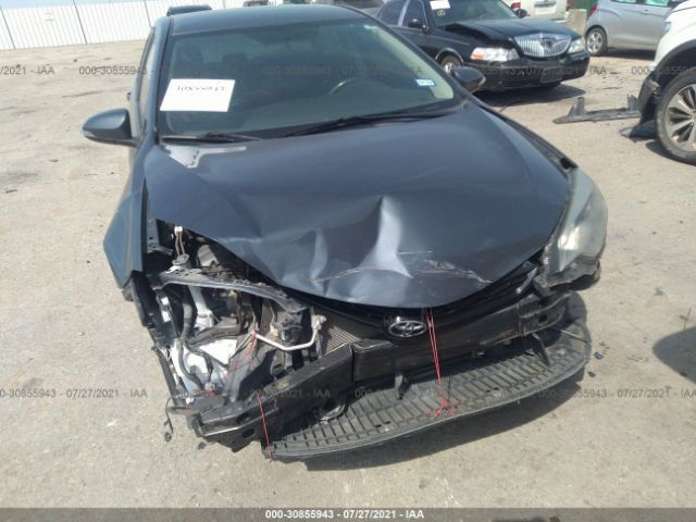 Photo 5 VIN: 2T1BURHE4EC104747 - TOYOTA COROLLA 