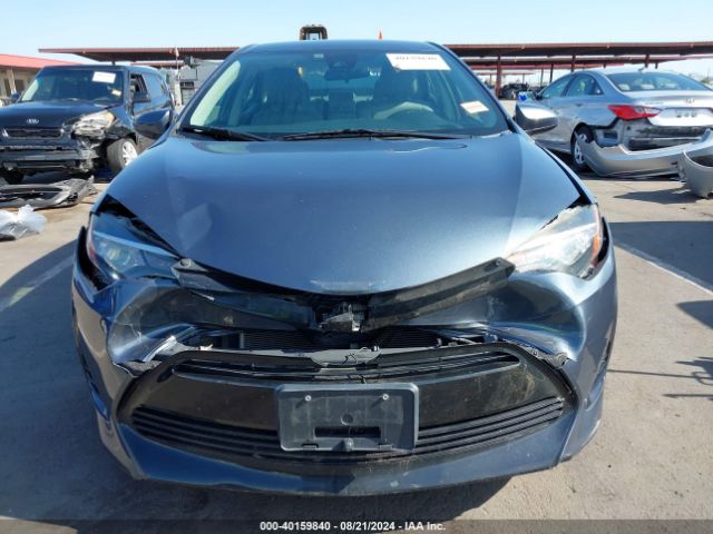 Photo 5 VIN: 2T1BURHE4HC777543 - TOYOTA COROLLA 