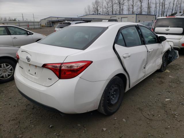 Photo 3 VIN: 2T1BURHE4JC066740 - TOYOTA COROLLA L 