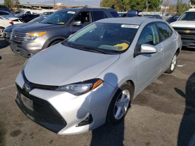 Photo 1 VIN: 2T1BURHE4JC068309 - TOYOTA COROLLA L 