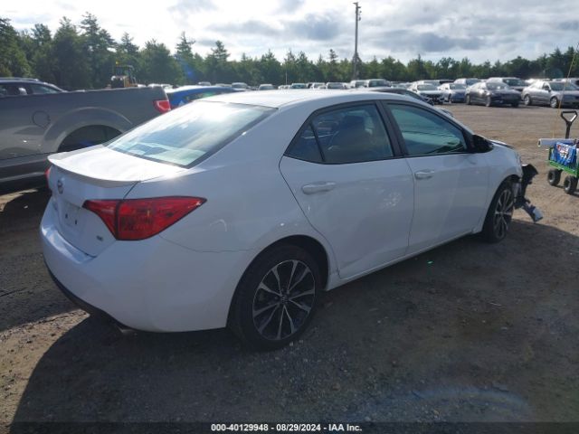 Photo 3 VIN: 2T1BURHE4JC092223 - TOYOTA COROLLA 