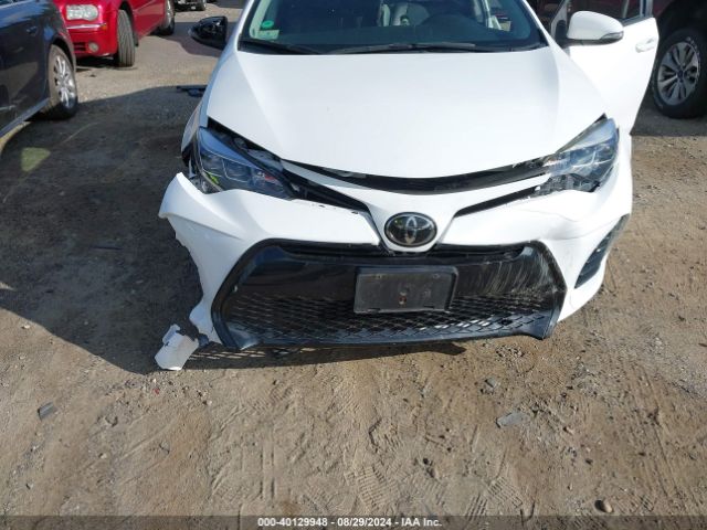 Photo 5 VIN: 2T1BURHE4JC092223 - TOYOTA COROLLA 