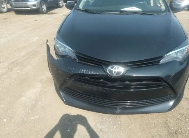 Photo 5 VIN: 2T1BURHE4JC102295 - TOYOTA COROLLA 