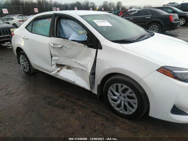 Photo 5 VIN: 2T1BURHE4JC997223 - TOYOTA COROLLA 