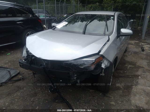 Photo 5 VIN: 2T1BURHE4KC159565 - TOYOTA COROLLA 