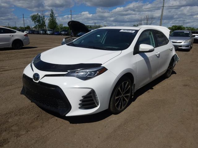 Photo 1 VIN: 2T1BURHE4KC161462 - TOYOTA COROLLA L 