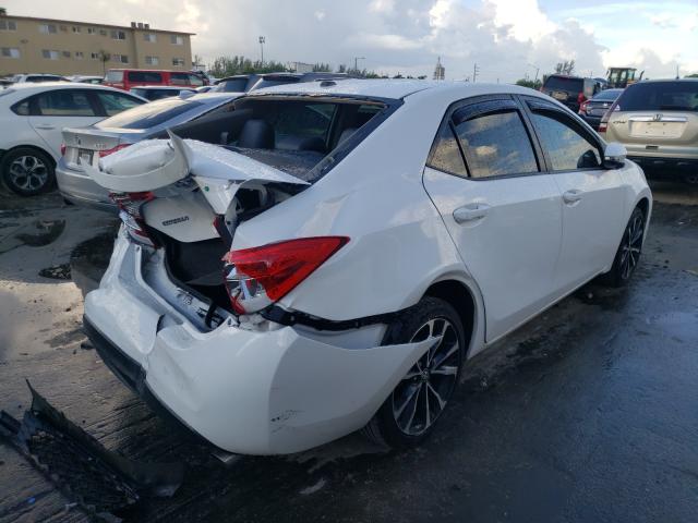 Photo 3 VIN: 2T1BURHE4KC174874 - TOYOTA COROLLA L 