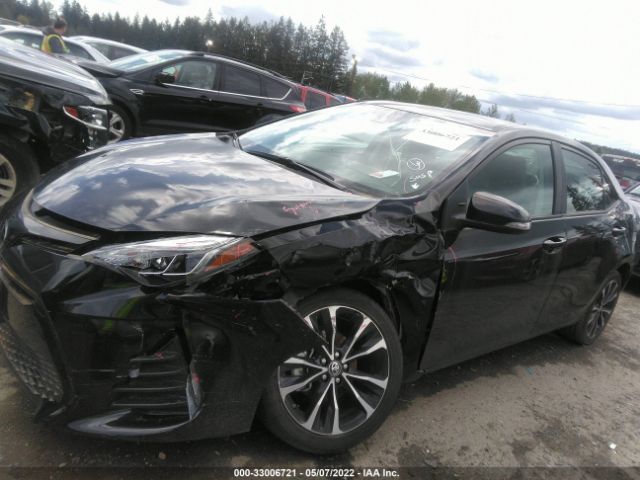 Photo 5 VIN: 2T1BURHE4KC208067 - TOYOTA COROLLA 