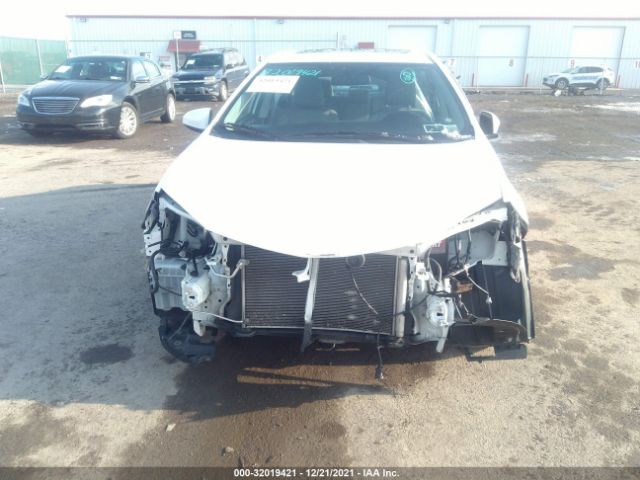 Photo 5 VIN: 2T1BURHE5EC215632 - TOYOTA COROLLA 