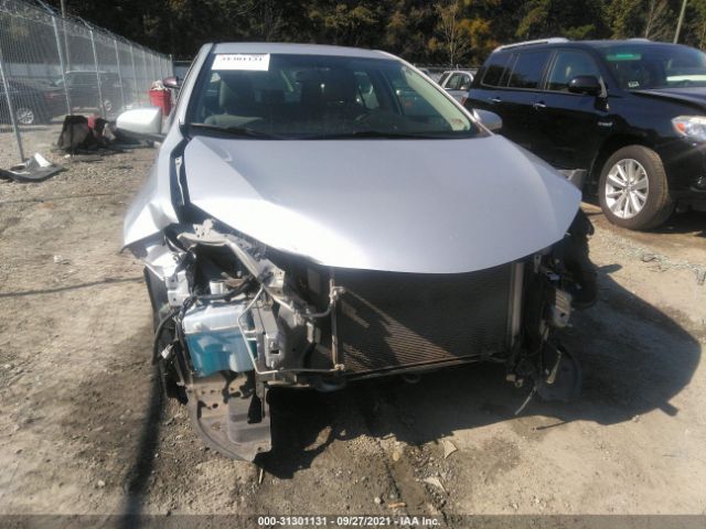 Photo 5 VIN: 2T1BURHE5EC222032 - TOYOTA COROLLA 