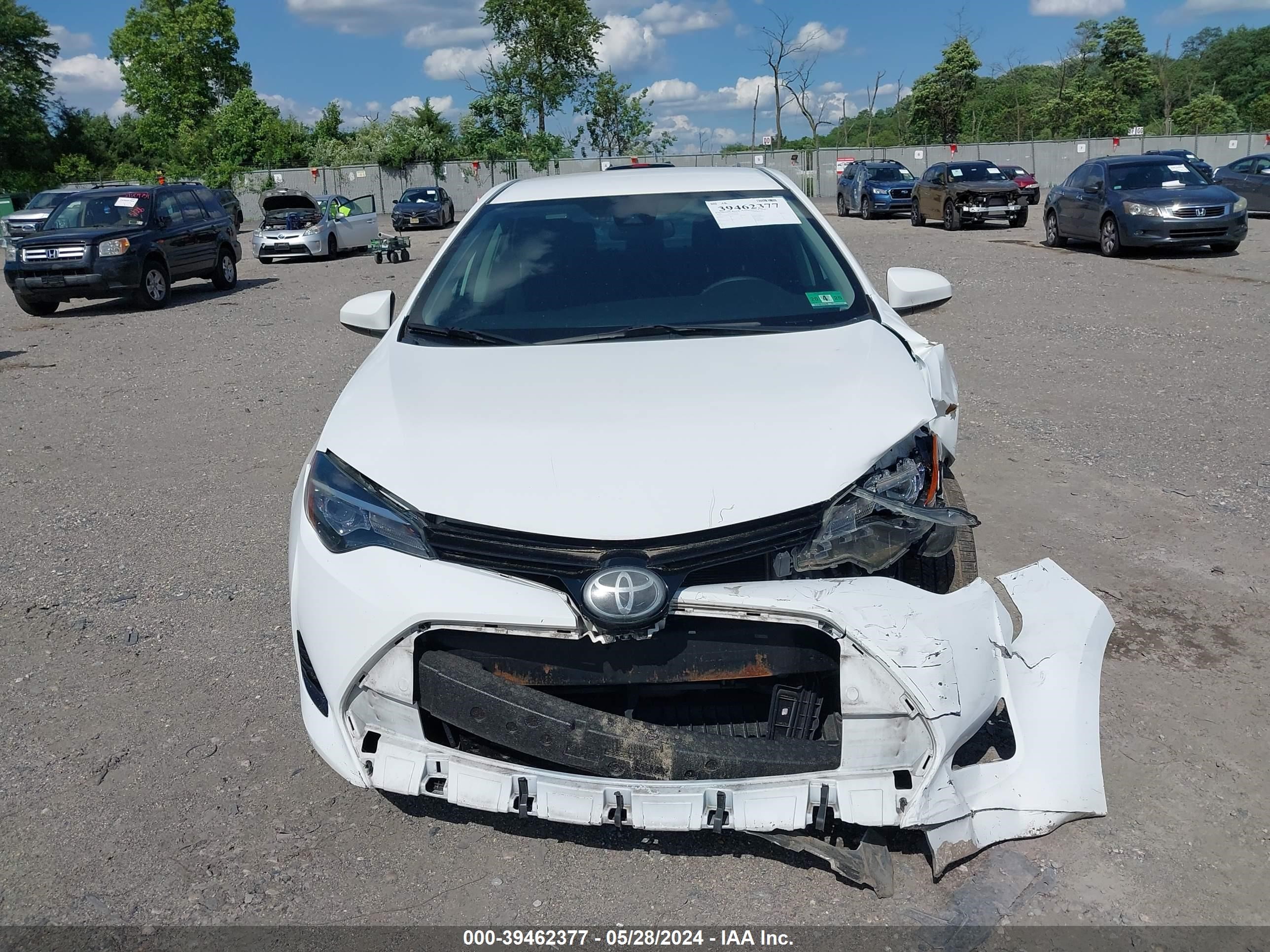 Photo 11 VIN: 2T1BURHE5JC007891 - TOYOTA COROLLA 