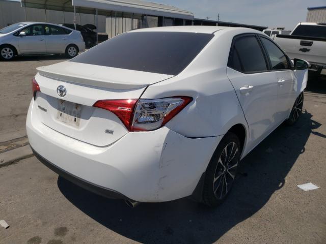 Photo 3 VIN: 2T1BURHE5JC036193 - TOYOTA COROLLA L 