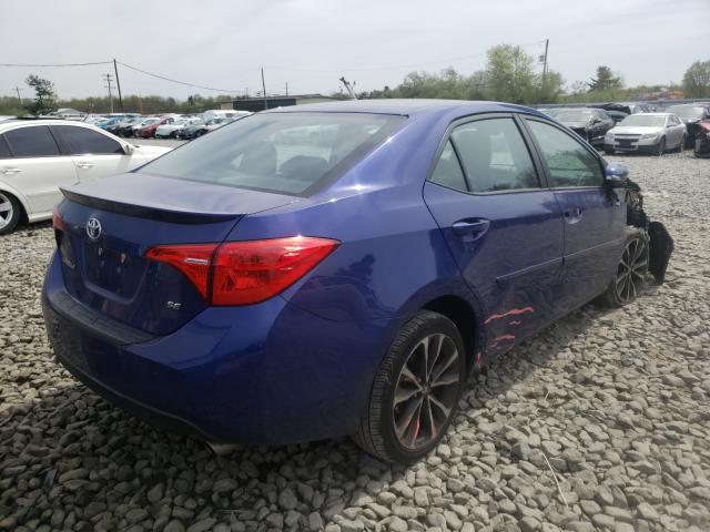 Photo 3 VIN: 2T1BURHE5JC055004 - TOYOTA COROLLA L 