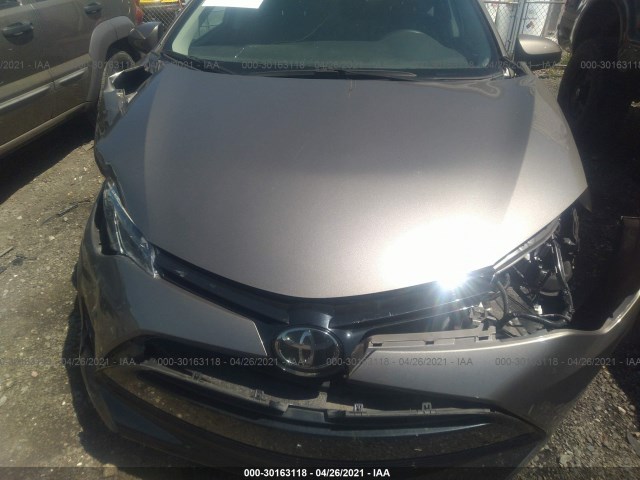 Photo 5 VIN: 2T1BURHE5JC060557 - TOYOTA COROLLA 