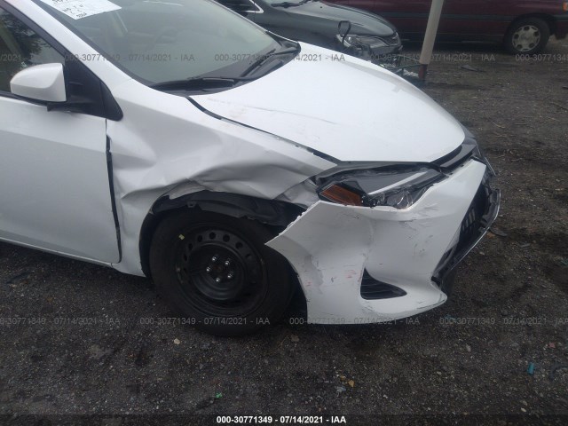 Photo 5 VIN: 2T1BURHE5JC098404 - TOYOTA COROLLA 