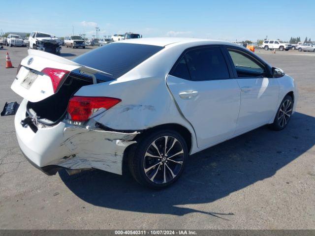 Photo 3 VIN: 2T1BURHE5JC121793 - TOYOTA COROLLA 