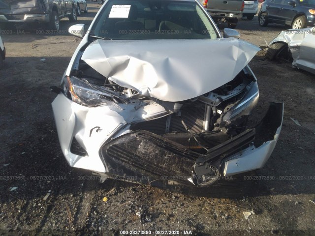 Photo 5 VIN: 2T1BURHE5KC126526 - TOYOTA COROLLA 