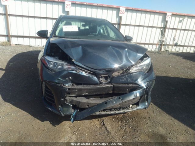 Photo 5 VIN: 2T1BURHE5KC149644 - TOYOTA COROLLA 