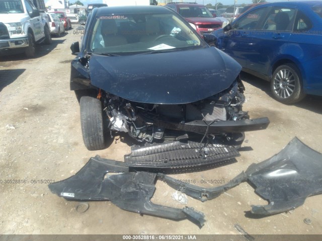 Photo 5 VIN: 2T1BURHE5KC164130 - TOYOTA COROLLA 