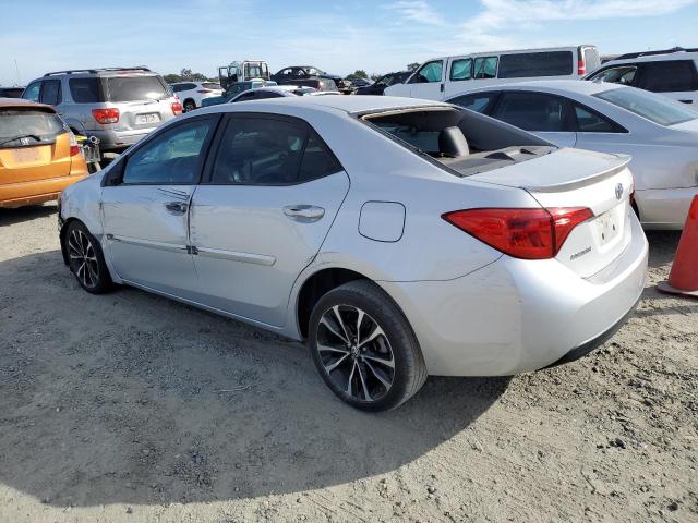 Photo 1 VIN: 2T1BURHE5KC207249 - TOYOTA COROLLA L 