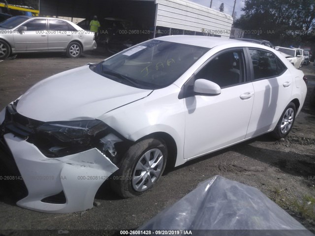 Photo 1 VIN: 2T1BURHE5KC215643 - TOYOTA COROLLA 