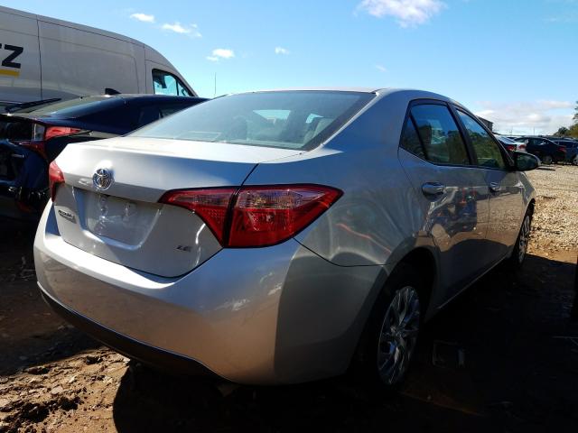 Photo 3 VIN: 2T1BURHE5KC242499 - TOYOTA COROLLA L 