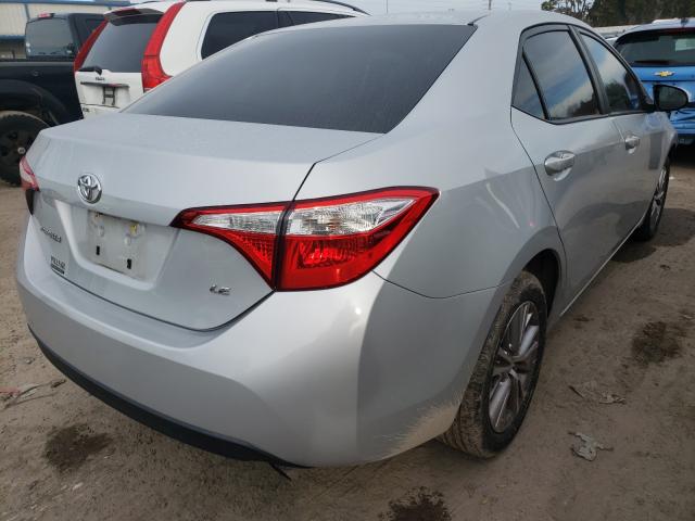 Photo 3 VIN: 2T1BURHE6EC215414 - TOYOTA COROLLA L 