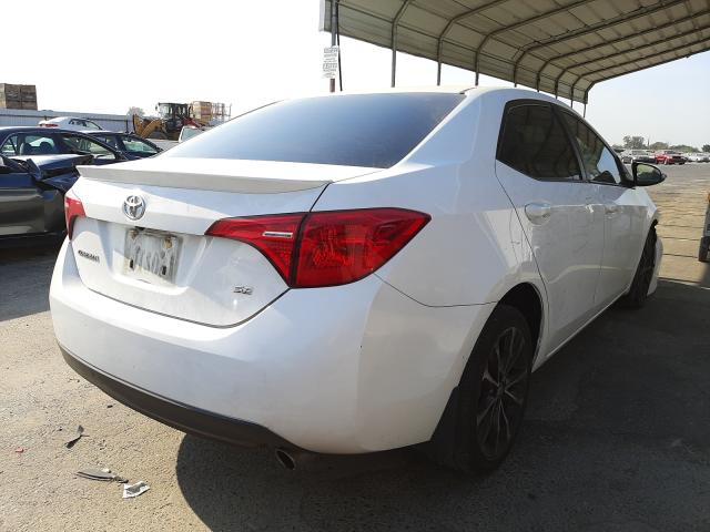 Photo 3 VIN: 2T1BURHE6JC049941 - TOYOTA COROLLA L 