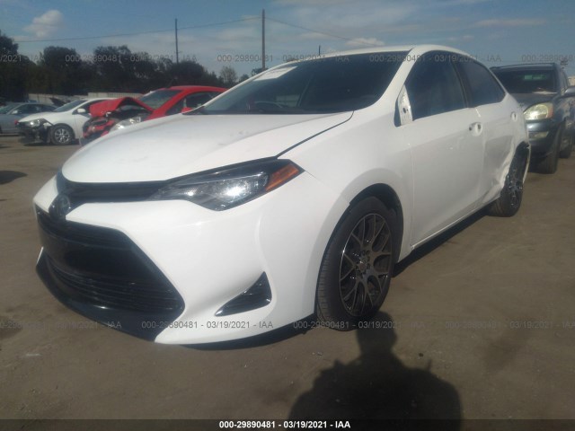 Photo 1 VIN: 2T1BURHE6JC067243 - TOYOTA COROLLA 