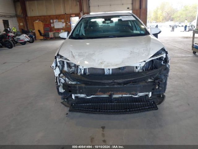 Photo 5 VIN: 2T1BURHE6JC082986 - TOYOTA COROLLA 