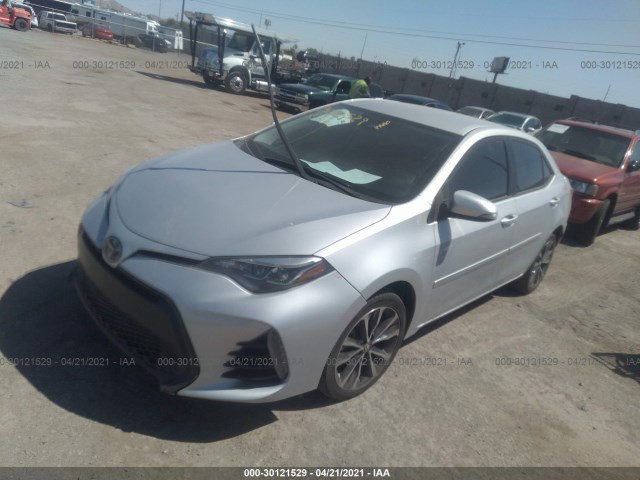 Photo 1 VIN: 2T1BURHE6JC089243 - TOYOTA COROLLA 