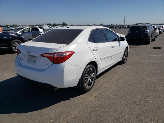 Photo 3 VIN: 2T1BURHE6JC980696 - TOYOTA COROLLA L 