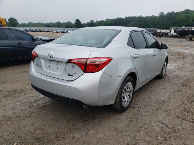 Photo 3 VIN: 2T1BURHE6KC125644 - TOYOTA COROLLA L 