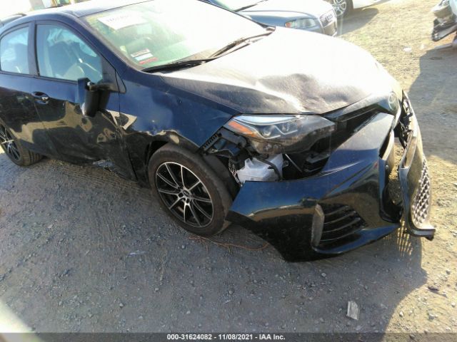 Photo 5 VIN: 2T1BURHE6KC129435 - TOYOTA COROLLA 