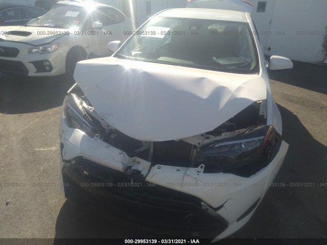 Photo 5 VIN: 2T1BURHE6KC134182 - TOYOTA COROLLA 