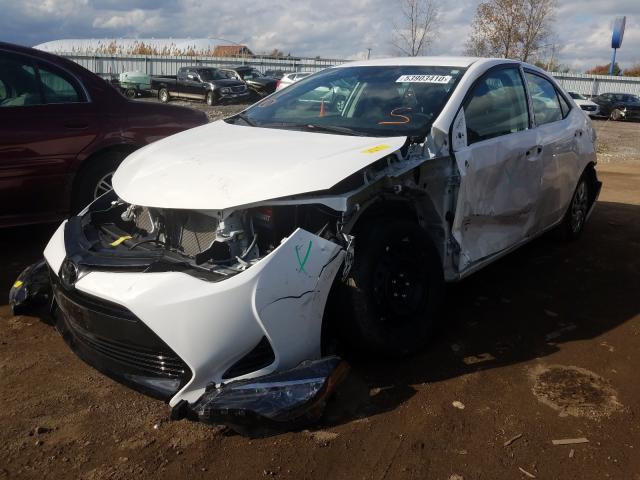 Photo 1 VIN: 2T1BURHE6KC158322 - TOYOTA COROLLA L 