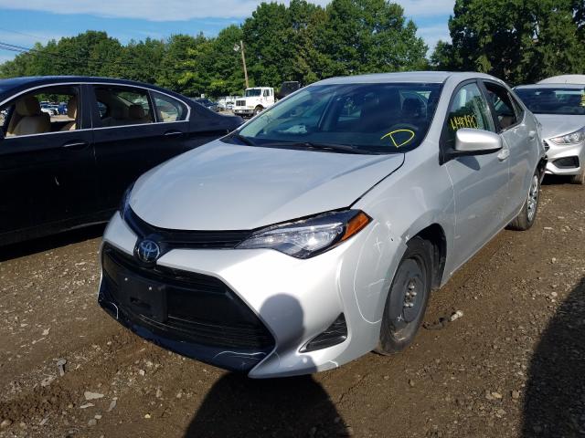 Photo 1 VIN: 2T1BURHE6KC242494 - TOYOTA COROLLA L 