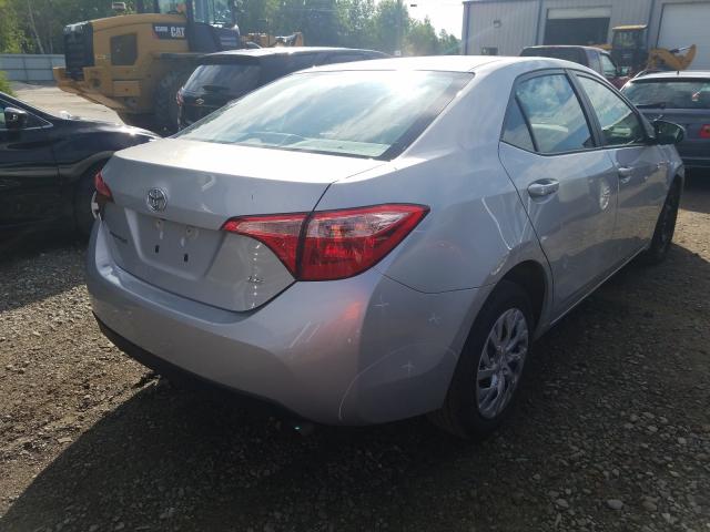 Photo 3 VIN: 2T1BURHE6KC242494 - TOYOTA COROLLA L 