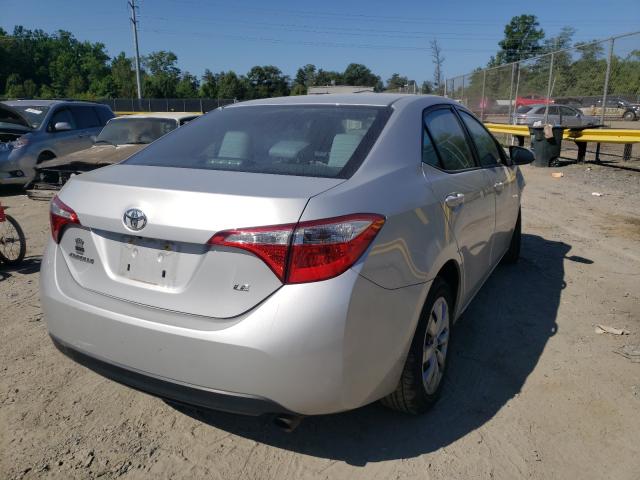 Photo 3 VIN: 2T1BURHE7GC709414 - TOYOTA COROLLA L 