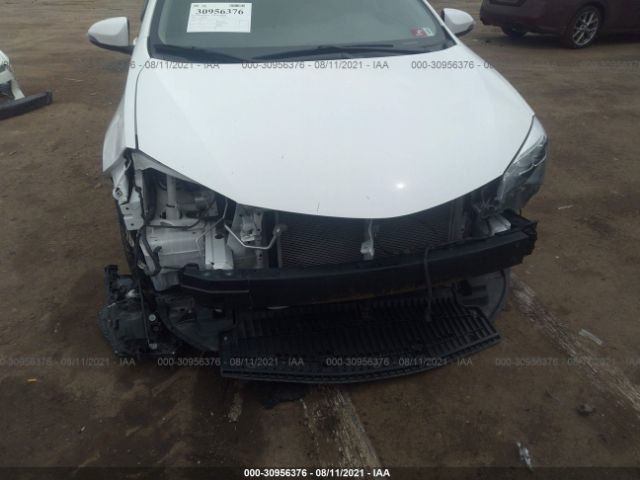 Photo 5 VIN: 2T1BURHE7JC012333 - TOYOTA COROLLA 