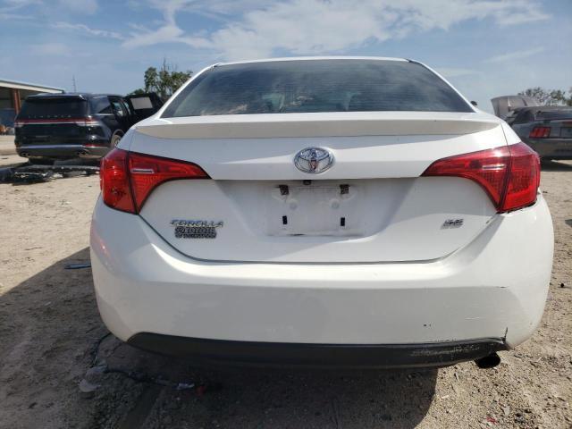 Photo 5 VIN: 2T1BURHE7JC025874 - TOYOTA COROLLA L 