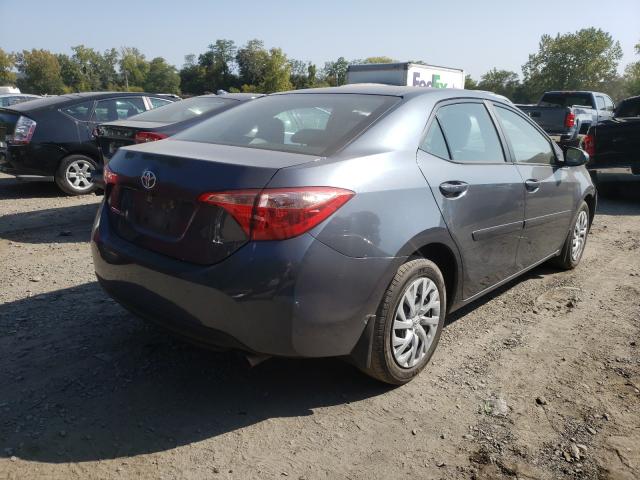 Photo 3 VIN: 2T1BURHE7JC028032 - TOYOTA COROLLA L 