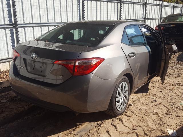 Photo 3 VIN: 2T1BURHE7JC033084 - TOYOTA COROLLA L 