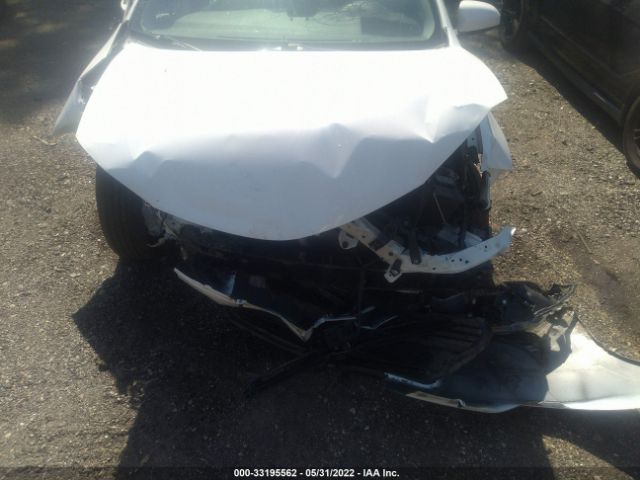 Photo 9 VIN: 2T1BURHE7JC036454 - TOYOTA COROLLA 