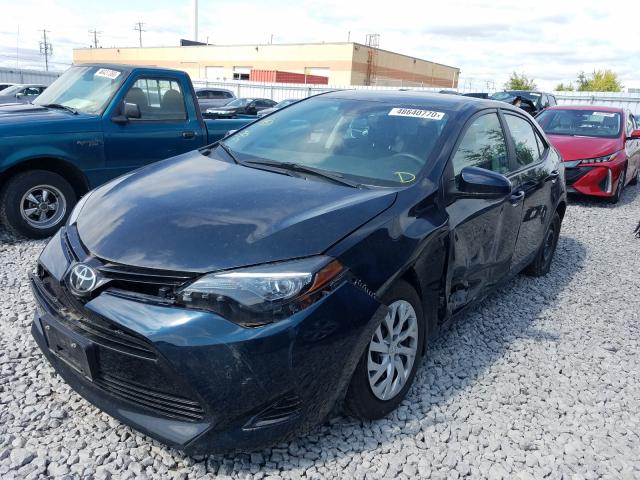 Photo 1 VIN: 2T1BURHE7JC061449 - TOYOTA COROLLA L 