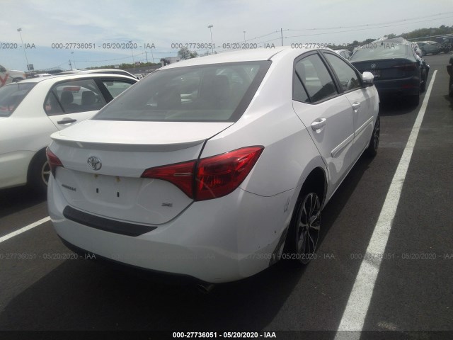 Photo 3 VIN: 2T1BURHE7JC063038 - TOYOTA COROLLA 