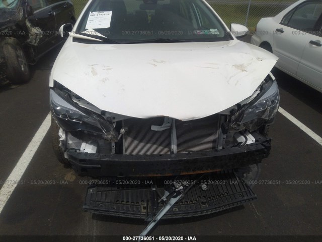 Photo 5 VIN: 2T1BURHE7JC063038 - TOYOTA COROLLA 